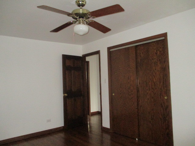 512 Highland Road Hinsdale, IL 60521 - Photo 20 of 25 wooden floor in a hall with a window