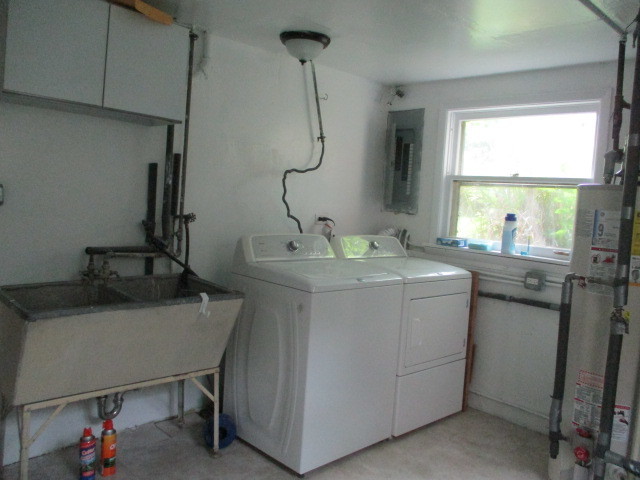 512 Highland Road Hinsdale, IL 60521 - Photo 24 of 25 a room with a sink cabinets and a window