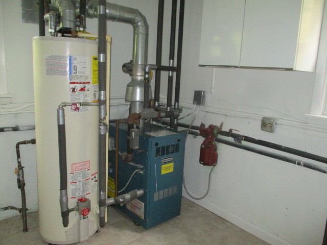 512 Highland Road Hinsdale, IL 60521 - Photo 25 of 25 a bathroom with a sink and mirror