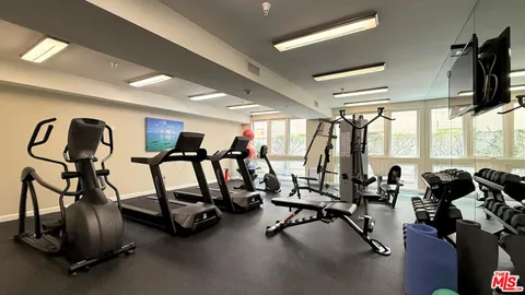 a view of a room with gym equipment