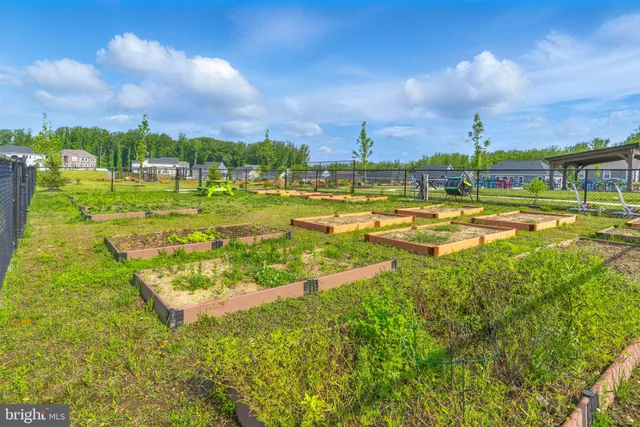 a swimming pool view with a outdoor seating