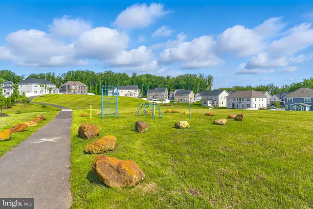 a view of a park with swings