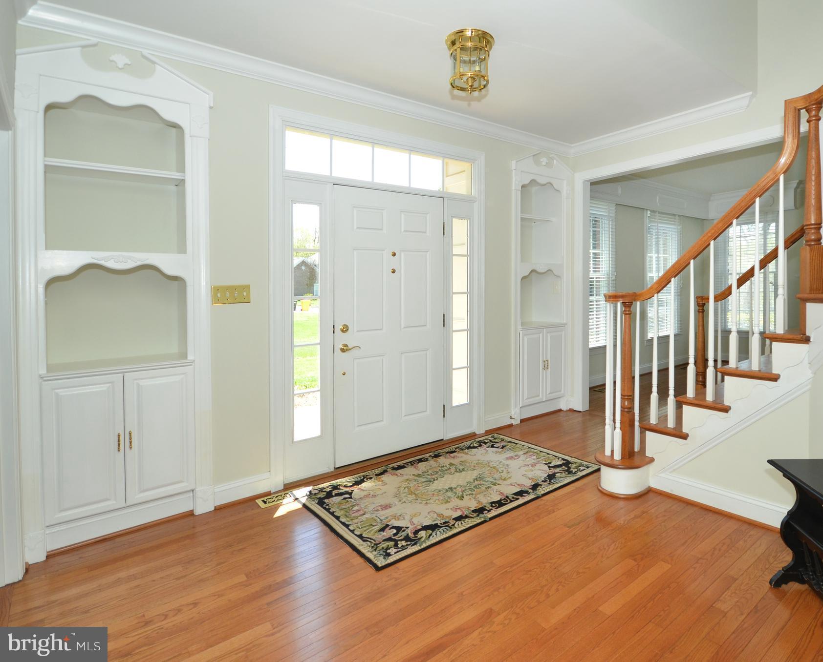 3504 Old Trail Road Edgewater, MD 21037 - Photo 3 of 30 Open Foyer With Custom Built Ins