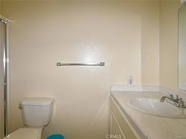 a bathroom with a sink and toilet