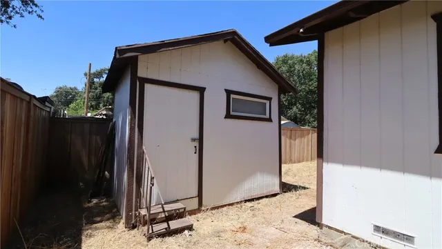 a front view of a house with a backyard