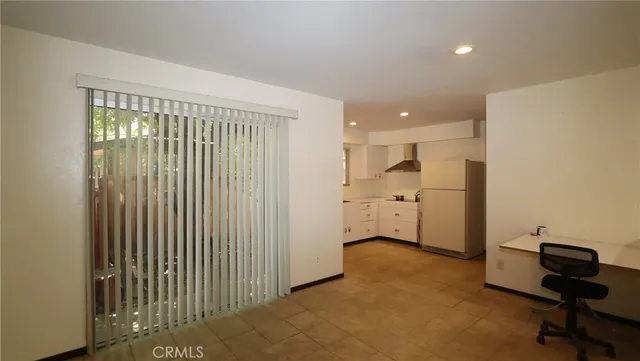 a view of a livingroom with a furniture