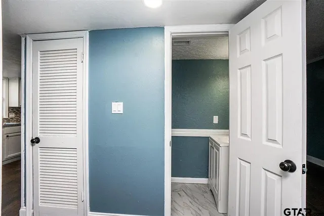 a view of a bathroom with a shower