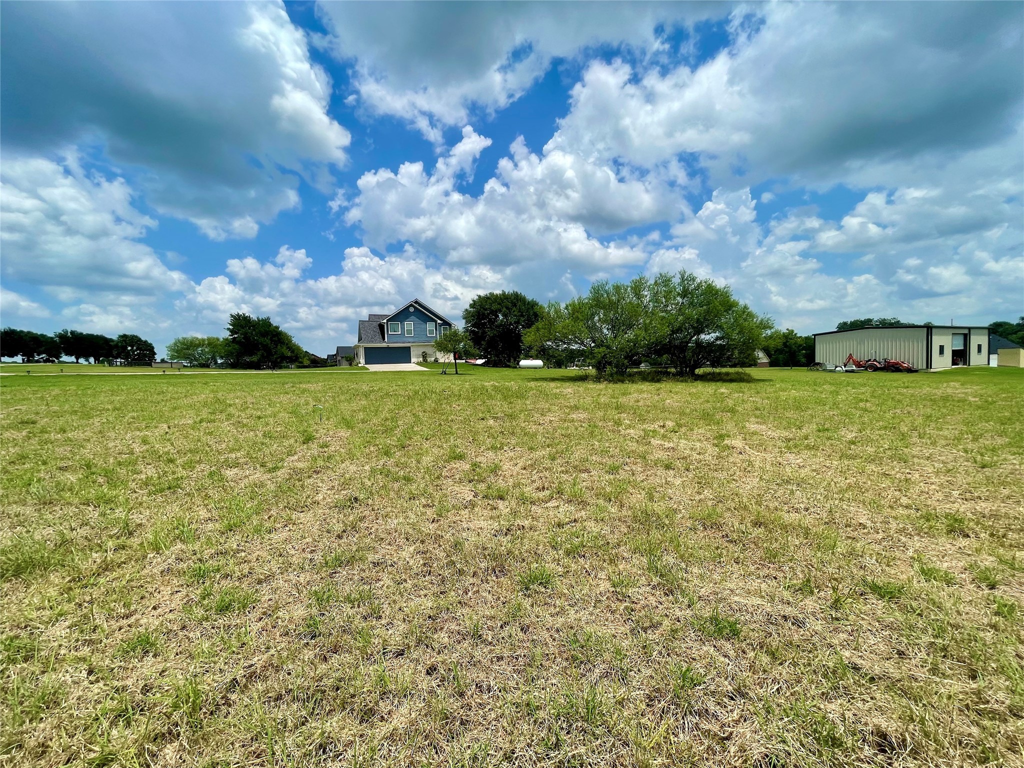 3395 Success Court Brenham, TX 77833 - Photo 6 of 10 a view of a green field with sky view