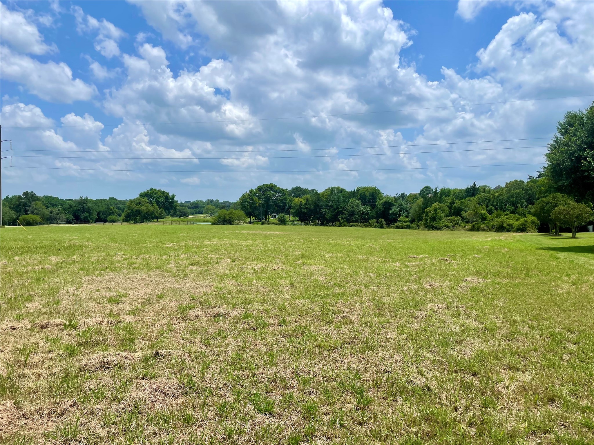 3395 Success Court Brenham, TX 77833 - Photo 10 of 10 a view of a lake with a big yard
