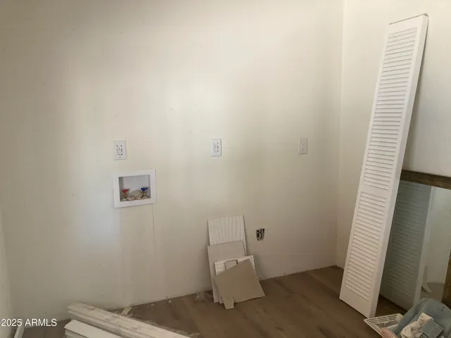 a view of a gallery with hallway