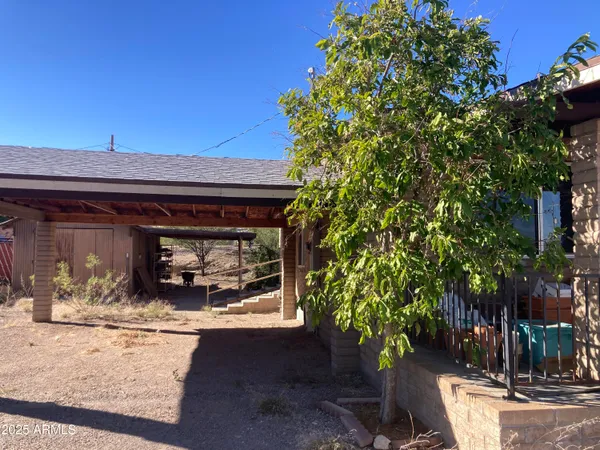 a view of a backyard with a patio