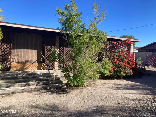 a kitchen with a stove and a microwave