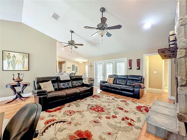 a large kitchen with stainless steel appliances granite countertop a large counter top and stainless steel appliances