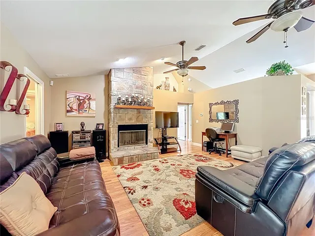 a bed room with a bed and a chandelier