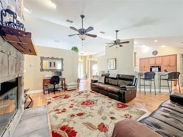 a bed room with a bed and a chandelier