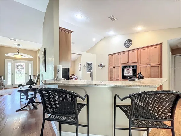 a bathroom with a sink a mirror and a shower