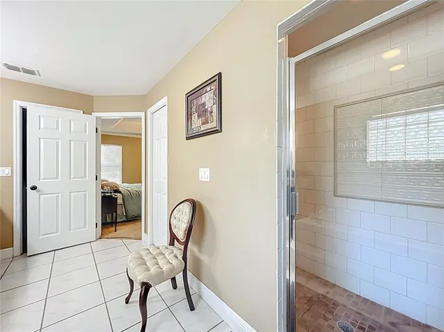 a view of an empty room with a window