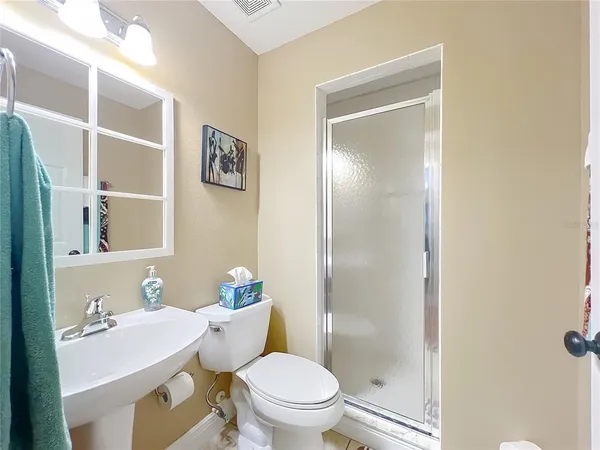 a view of a lake with a house swimming pool and outdoor space