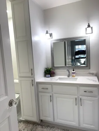 a bathroom with a shower and a tub