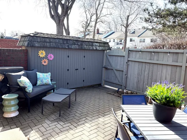 a view of a yard with a tree