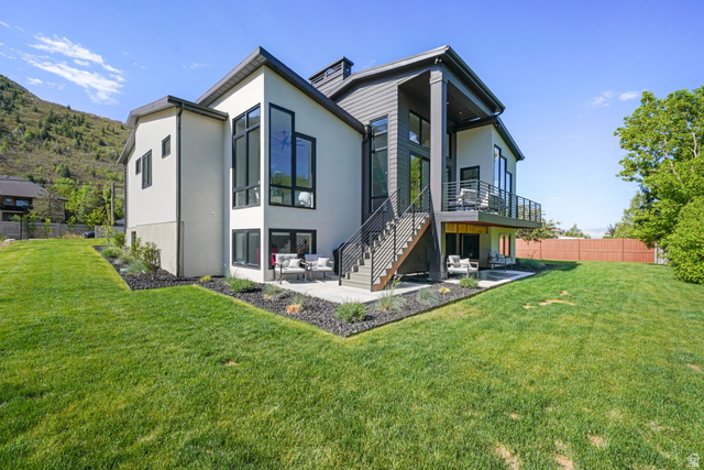 3667 Little Cottonwood Road, Unit 1 Sandy, UT 84092 - Photo 4 of 49 Contemporary exterior featuring a multi-level design with stucco and siding finishes