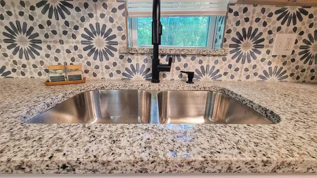 a view of a sink a window and floor