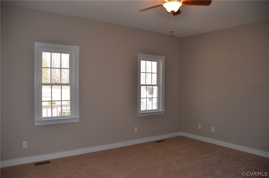 1128 Signboard Road Bumpass, VA 23024 - Photo 11 of 20 an empty room with a window