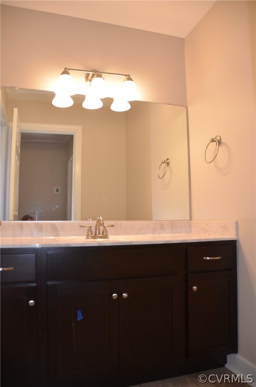 1128 Signboard Road Bumpass, VA 23024 - Photo 16 of 20 a bathroom with a sink and mirror