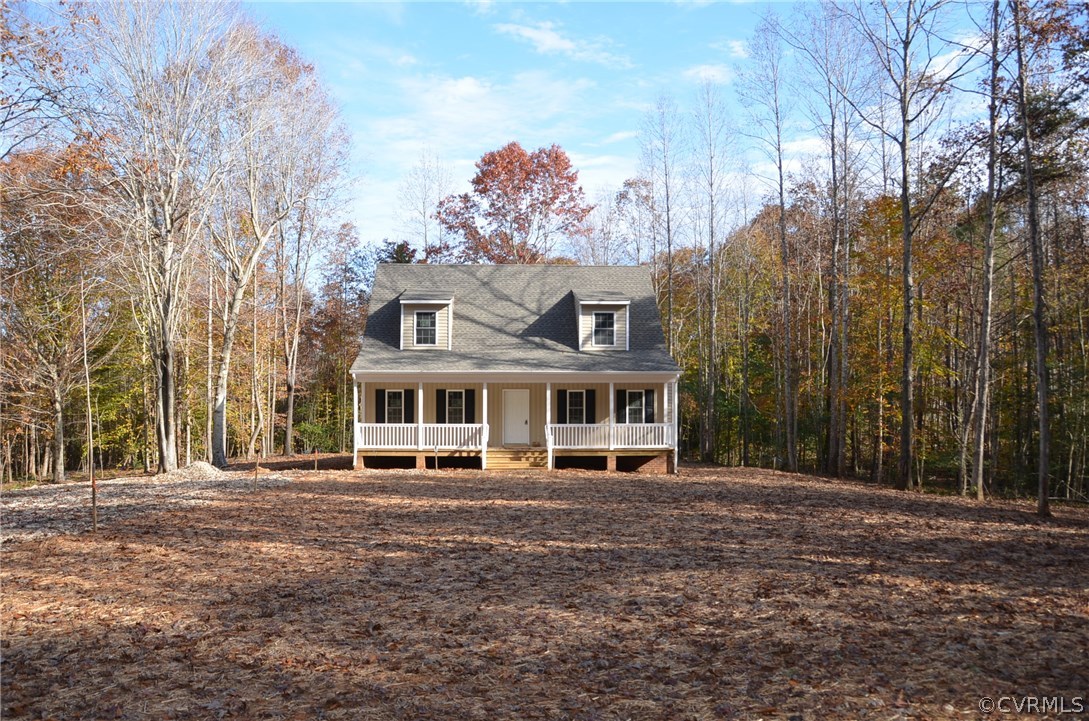 1128 Signboard Road Bumpass, VA 23024 - Photo 2 of 20 a front view of a house with a garden