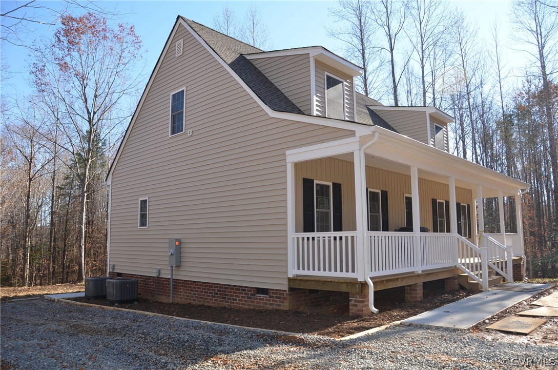 1128 Signboard Road Bumpass, VA 23024 - Photo 3 of 20 a view of a house with a yard