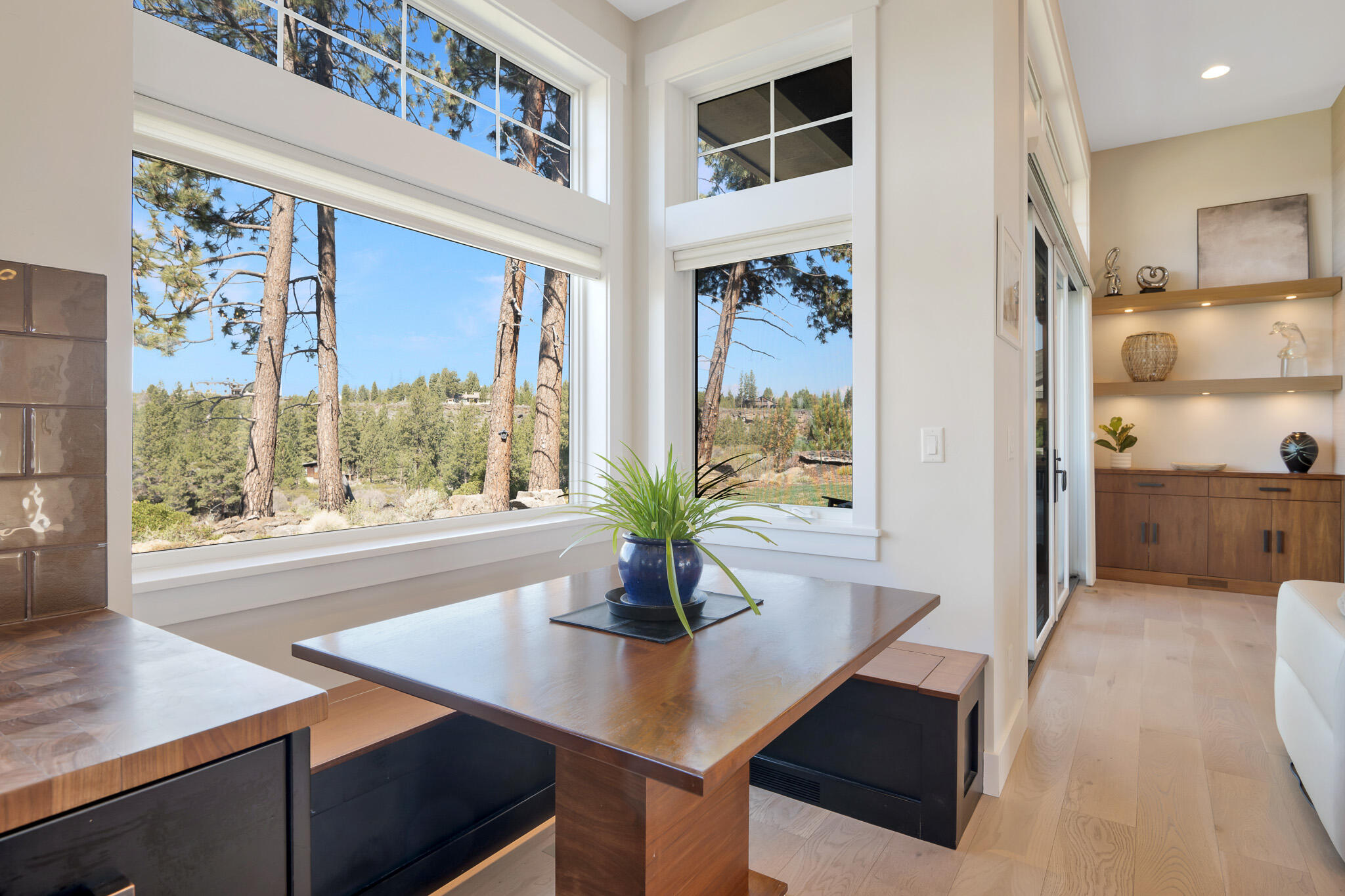 60871 River Rim Drive Bend, OR 97702 - Photo 16 of 42 a view of kitchen with furniture and large window