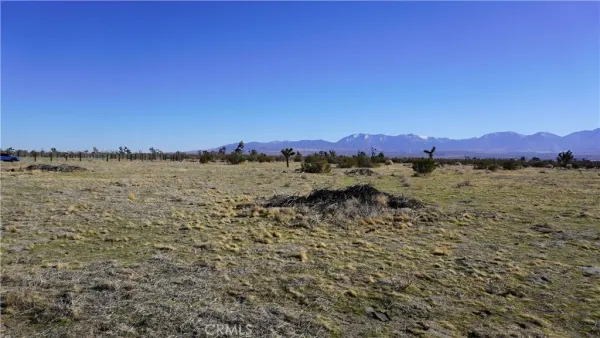 a view of ocean with sunset