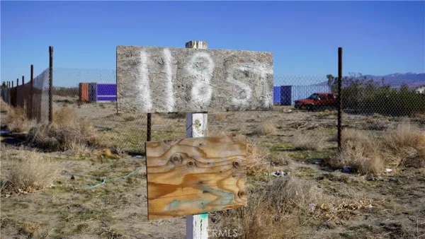 a view of water heater and building in the background