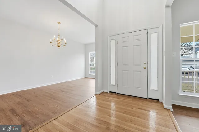 a bathroom with a toilet a sink and a mirror