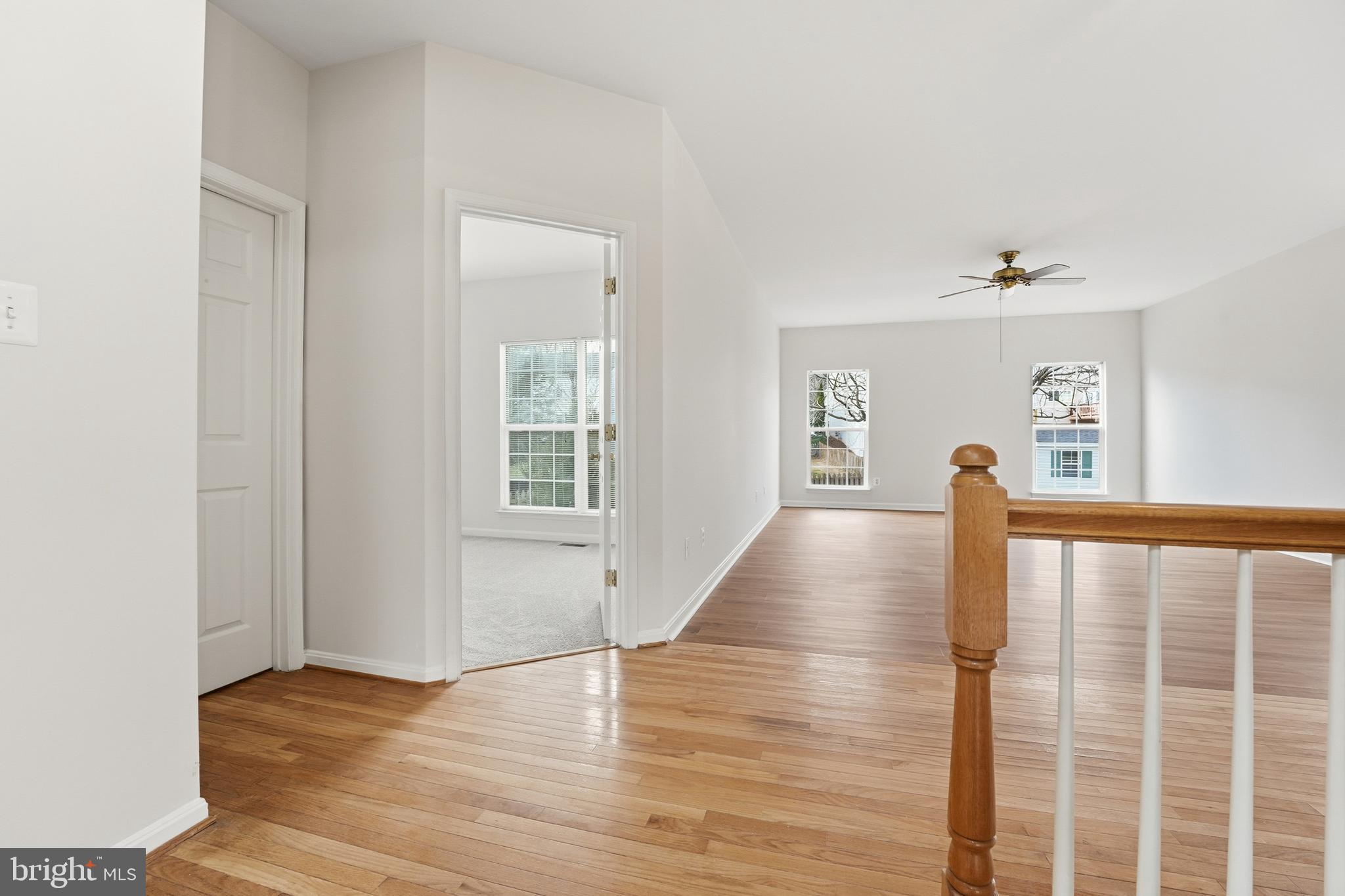 901 Woodcrest Loop Culpeper, VA 22701 - Photo 16 of 61 a view of empty room with wooden floor and fan