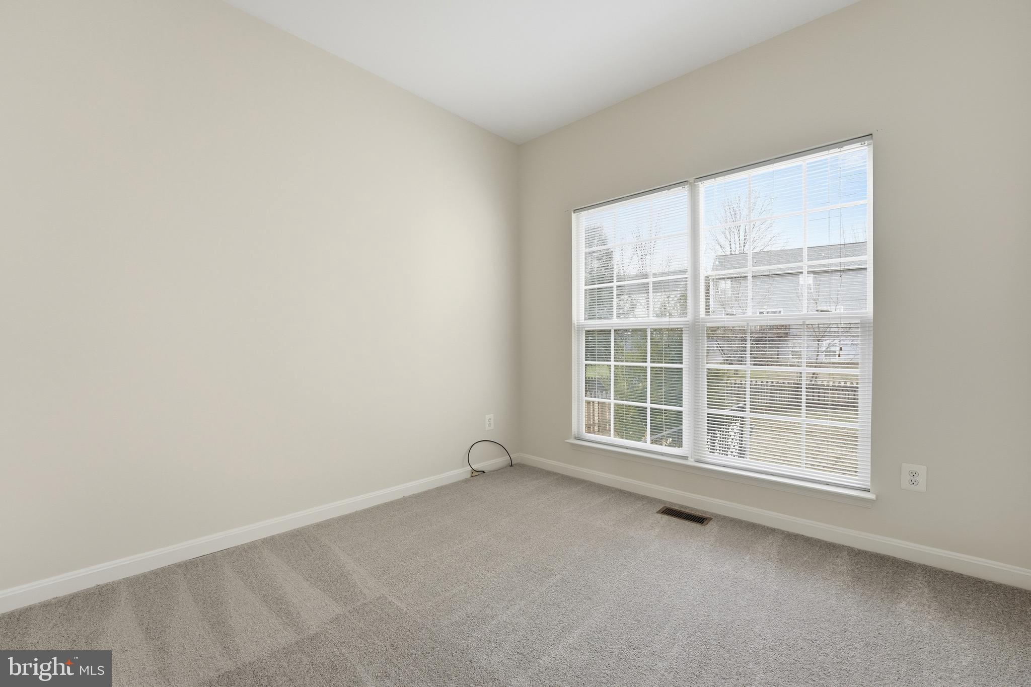 901 Woodcrest Loop Culpeper, VA 22701 - Photo 18 of 61 an empty room with a window