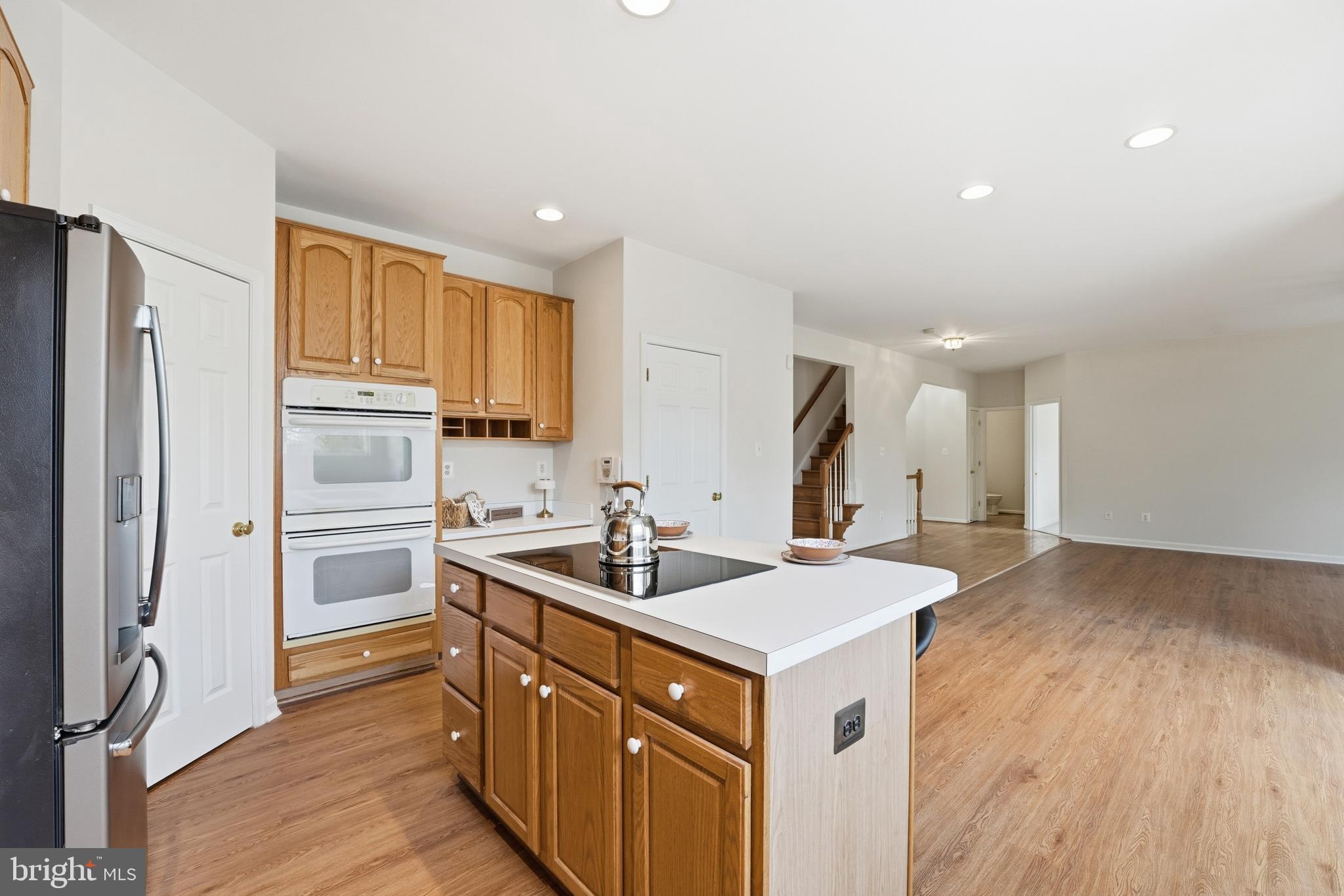 901 Woodcrest Loop Culpeper, VA 22701 - Photo 28 of 61 a kitchen with a sink stove and refrigerator