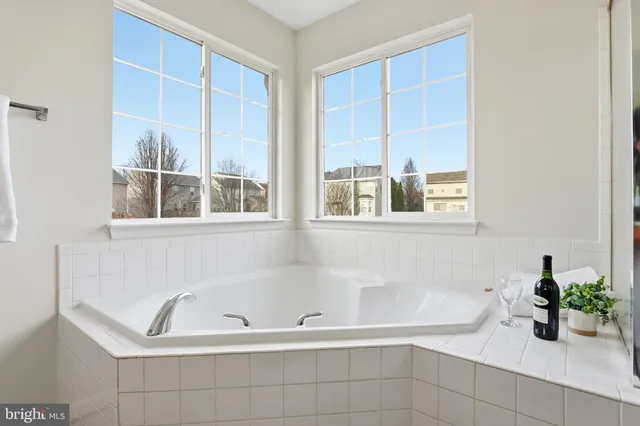 a view of a balcony with wooden fence