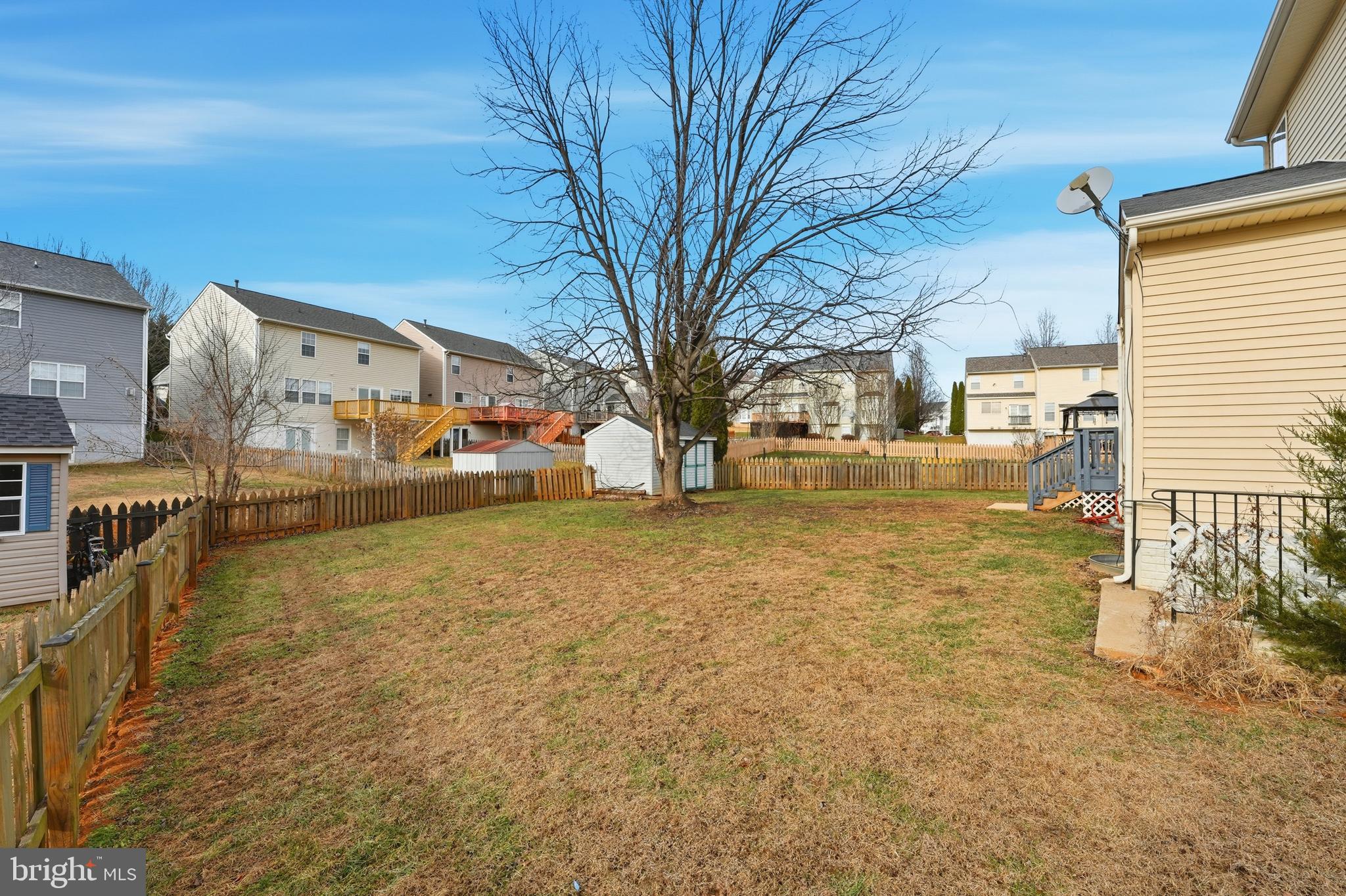 901 Woodcrest Loop Culpeper, VA 22701 - Photo 59 of 61 a view of a yard with a house