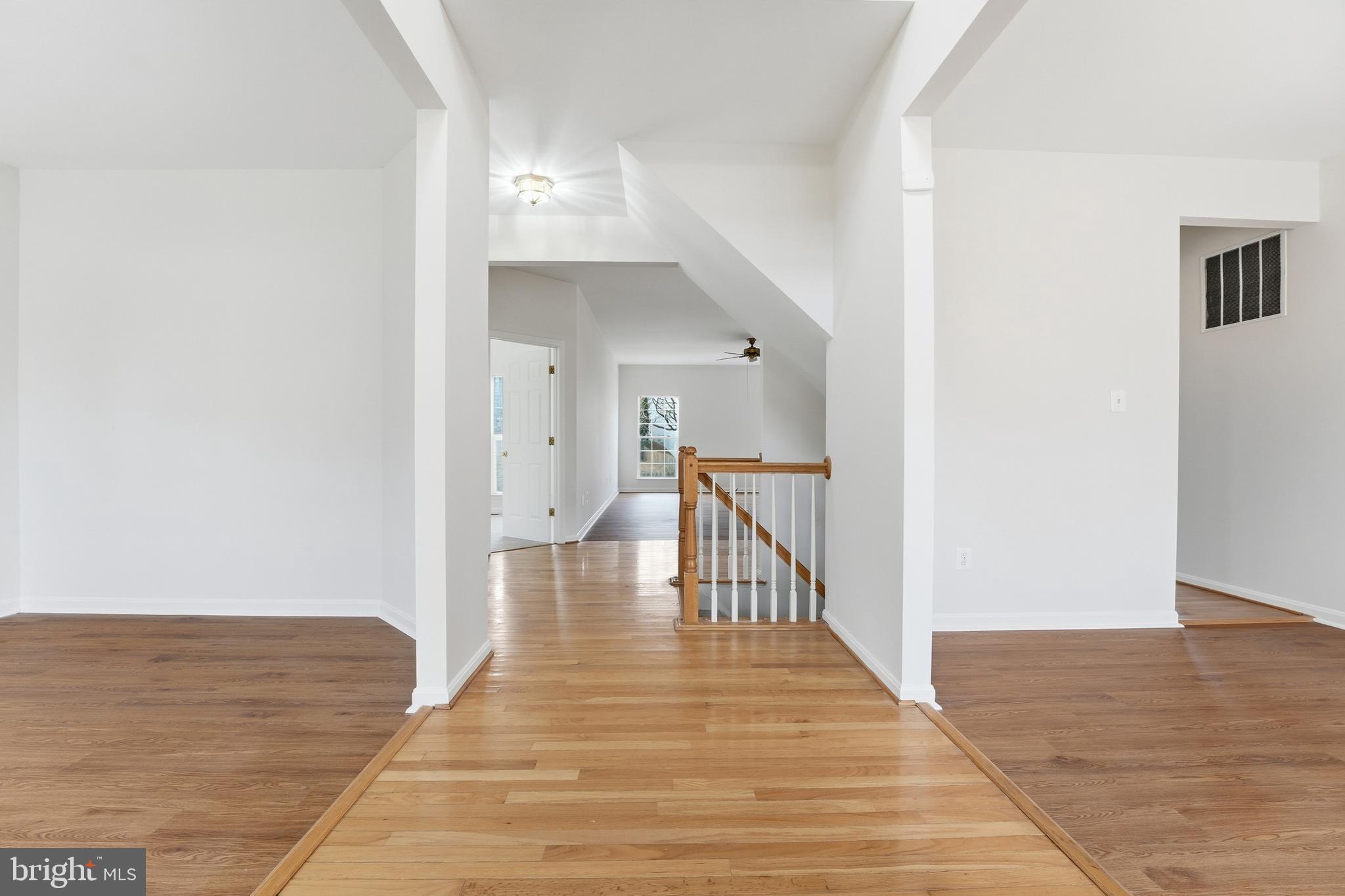 901 Woodcrest Loop Culpeper, VA 22701 - Photo 10 of 61 a view of entryway and hall with wooden floor