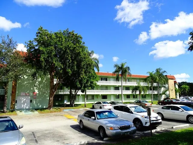a car parked in front of a house