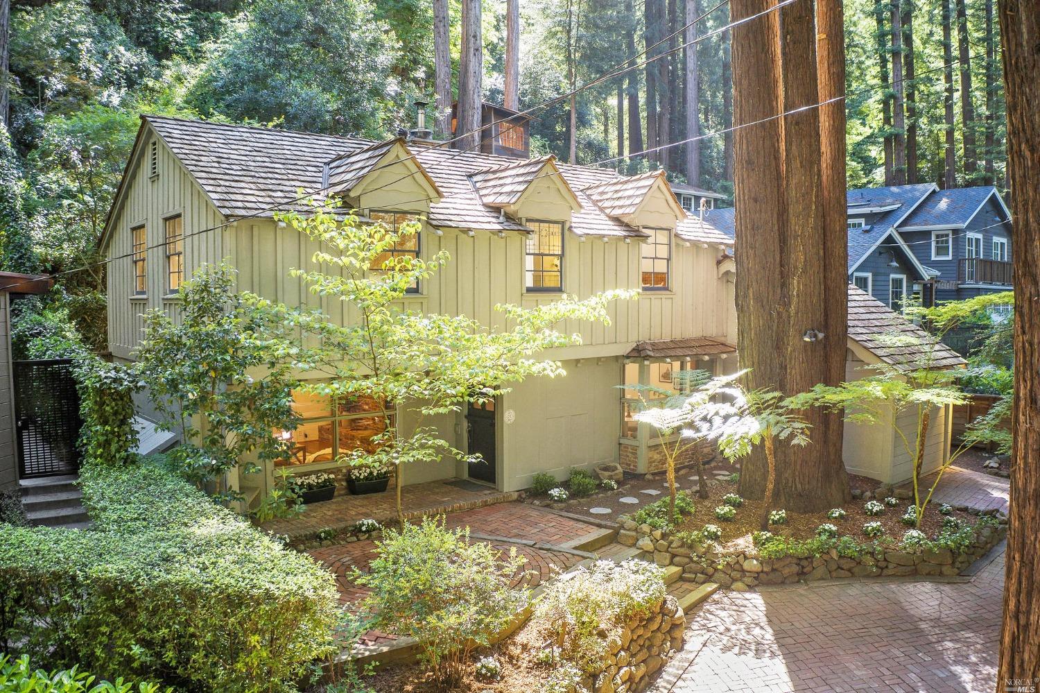 a view of a patio with table and chairs and potted plants