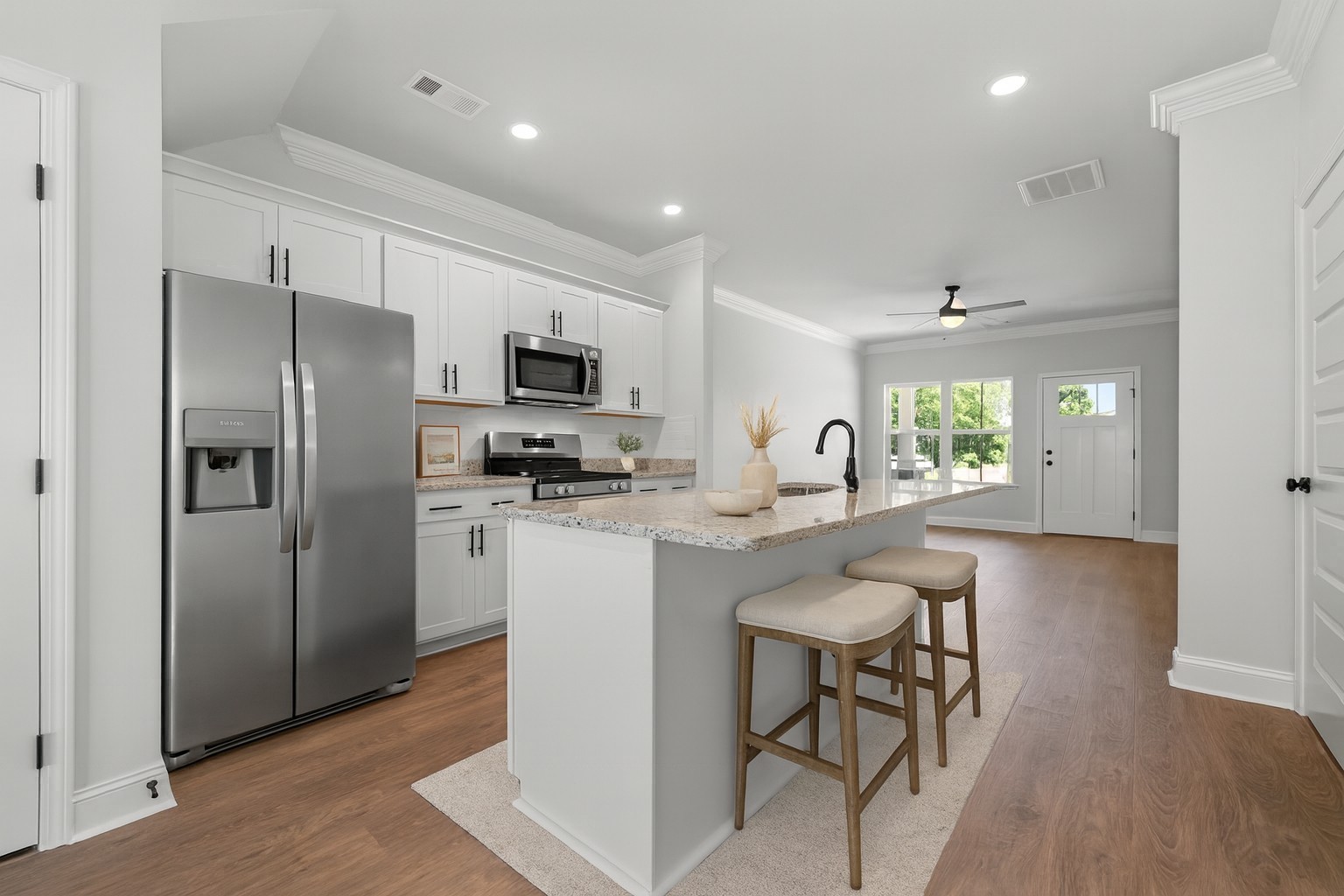 527 Rohan Drive Murfreesboro, TN 37129 - Photo 2 of 20 a kitchen with refrigerator and microwave