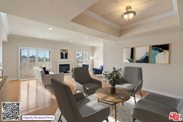 a living room with furniture a fireplace and a table