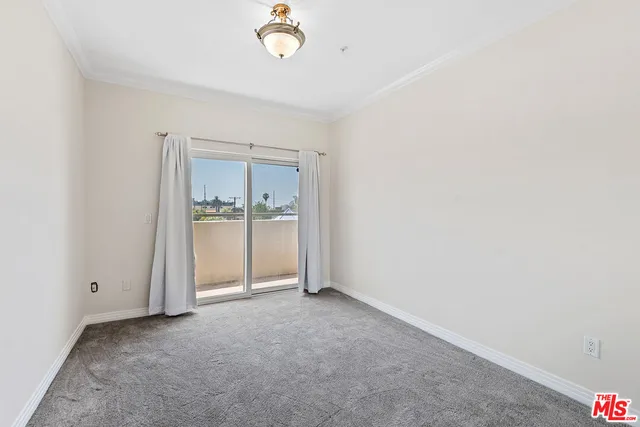 an empty room with a bathroom