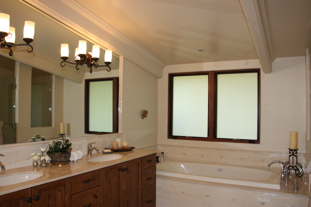 212 Alston Road Montecito, CA 93108 - Photo 7 of 19 a bathroom with a sink and a mirror