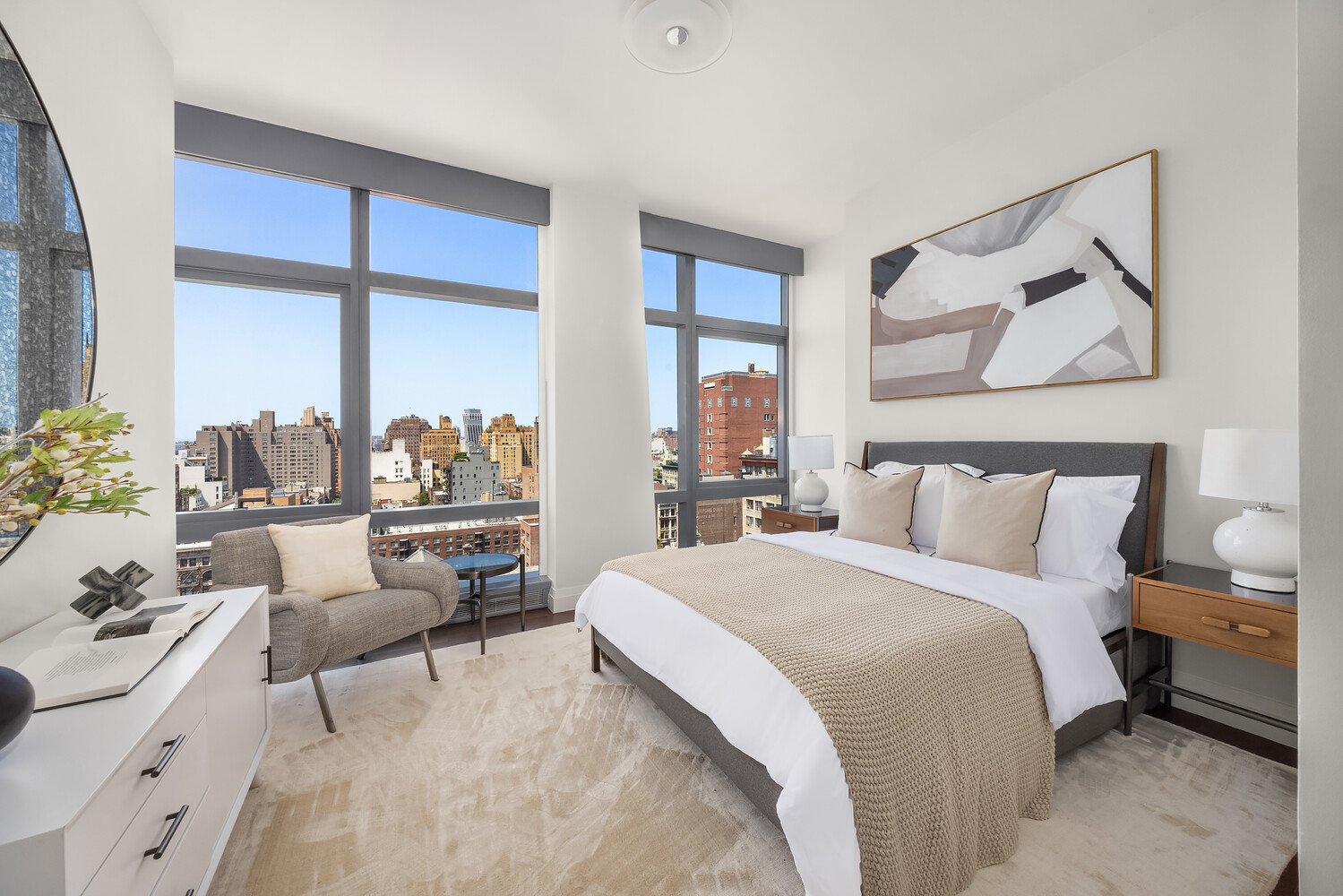 35 West 15th Street, Unit 13C Manhattan, NY 10011 - Photo 11 of 17 a spacious bedroom with a large bed and a balcony