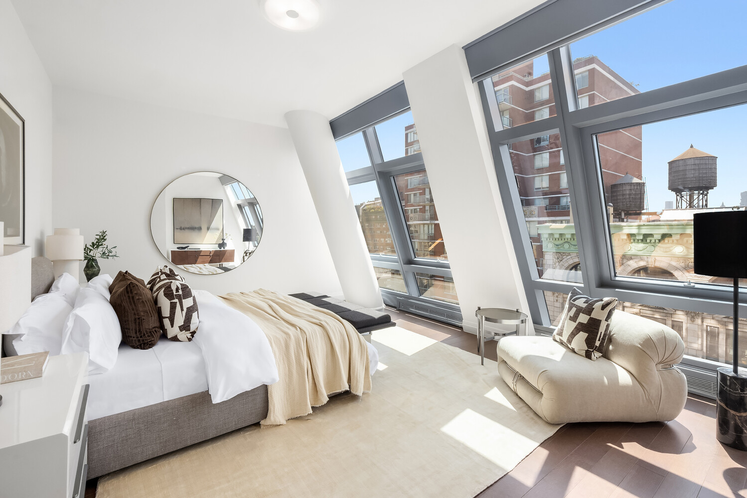 35 West 15th Street, Unit 13C Manhattan, NY 10011 - Photo 8 of 17 a bedroom with bed couch and window