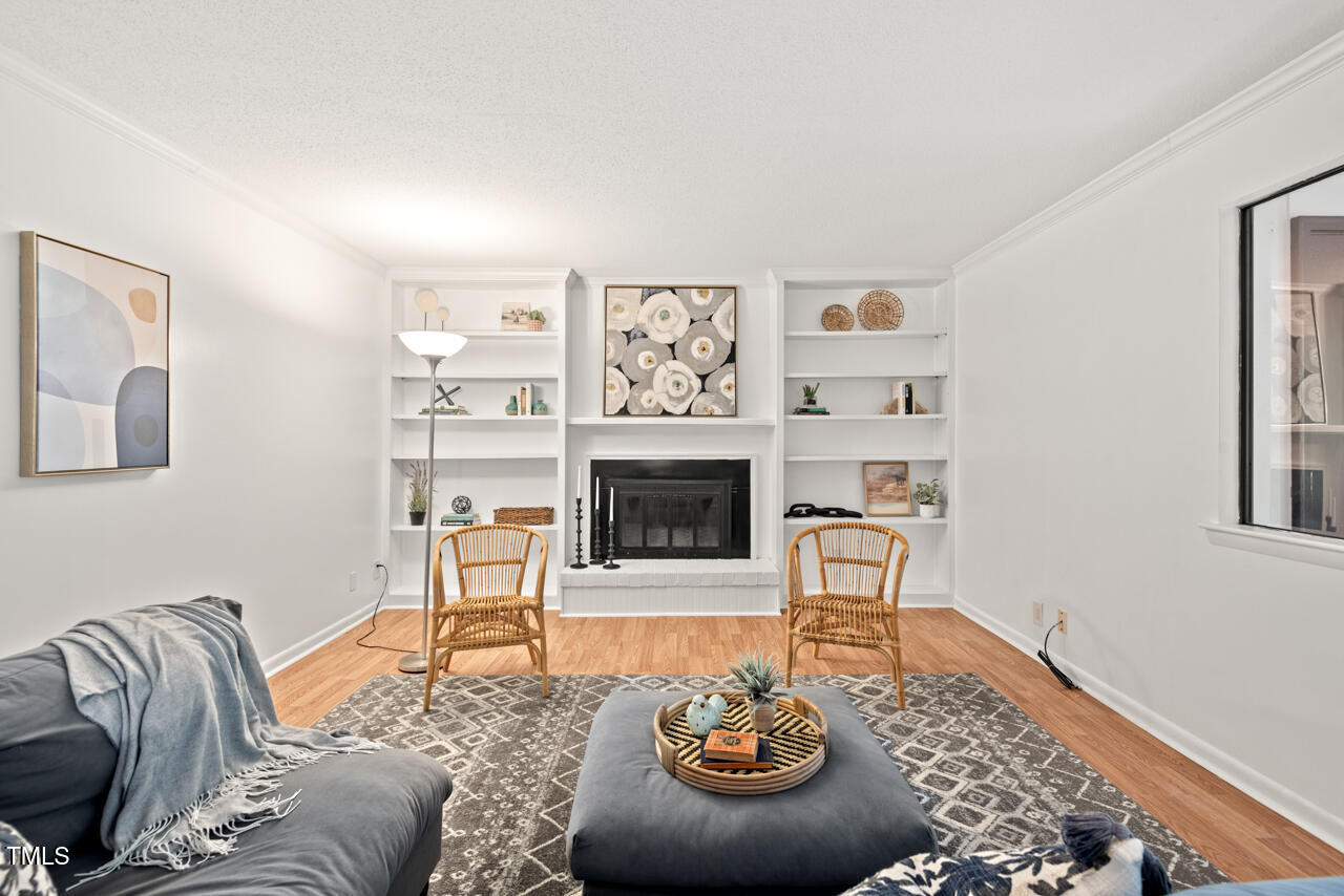3086 Colony Road, Unit C Durham, NC 27705 - Photo 9 of 44 a living room with furniture and a fireplace