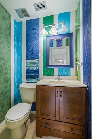 a bathroom with a sink and a toilet